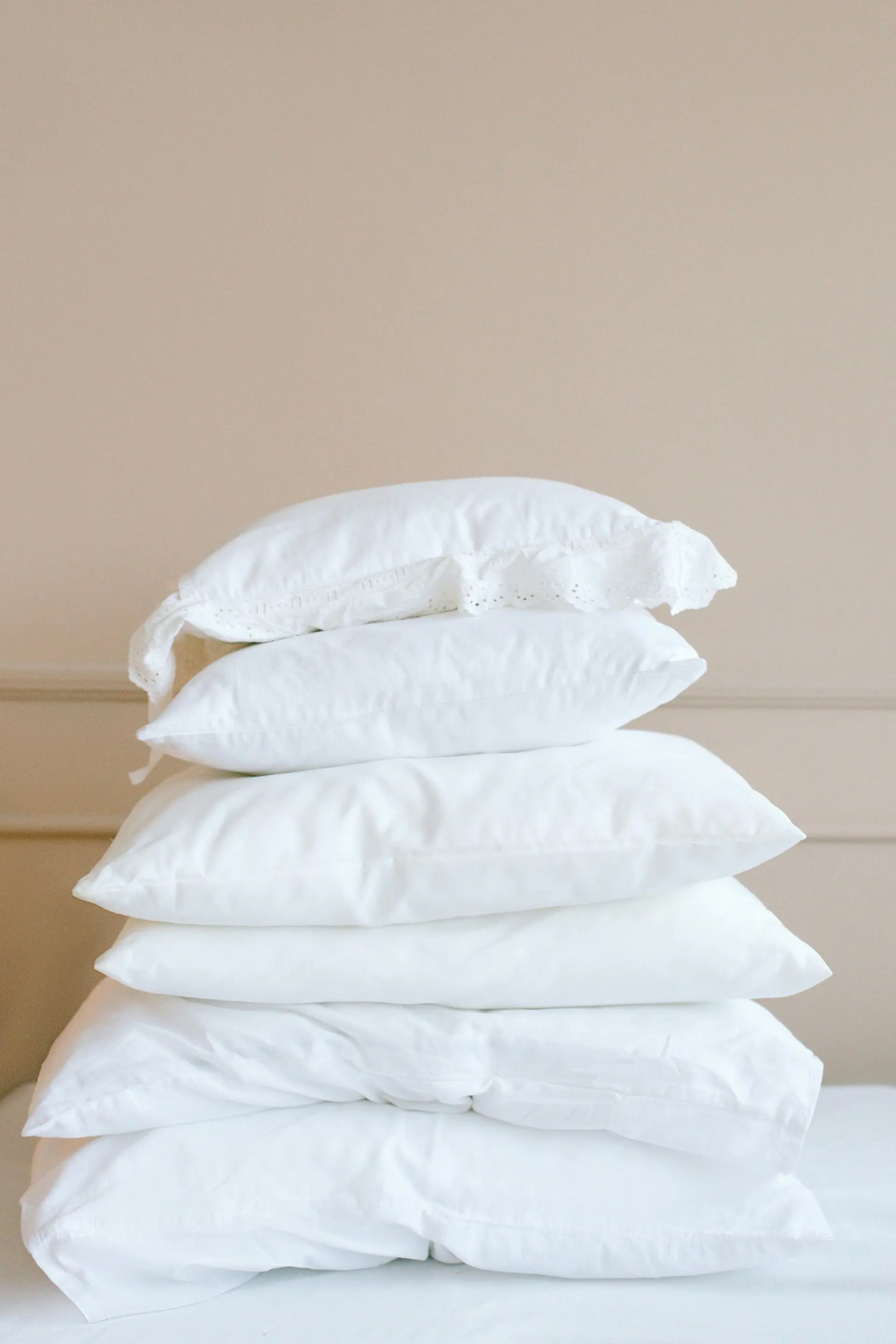 Stack of clean white bed pillows